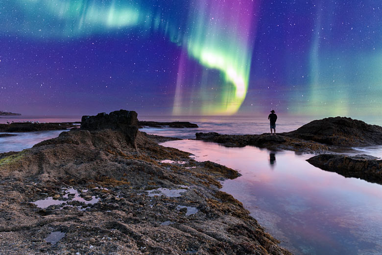 Spy the Aurora Borealis over the sea