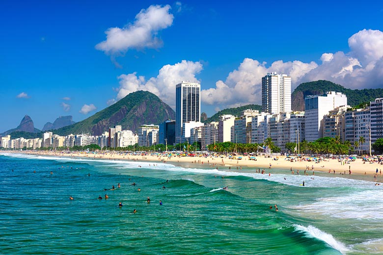 Catch the waves on Copacabana Beach