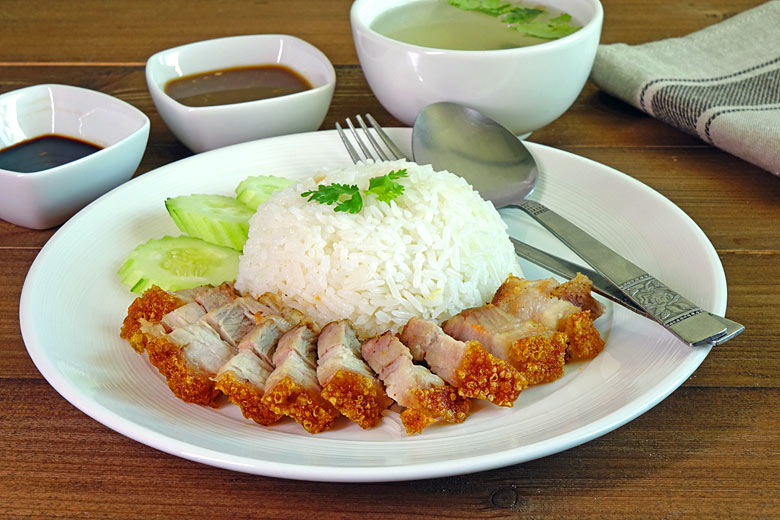 Delve into crispy pork with sticky rice