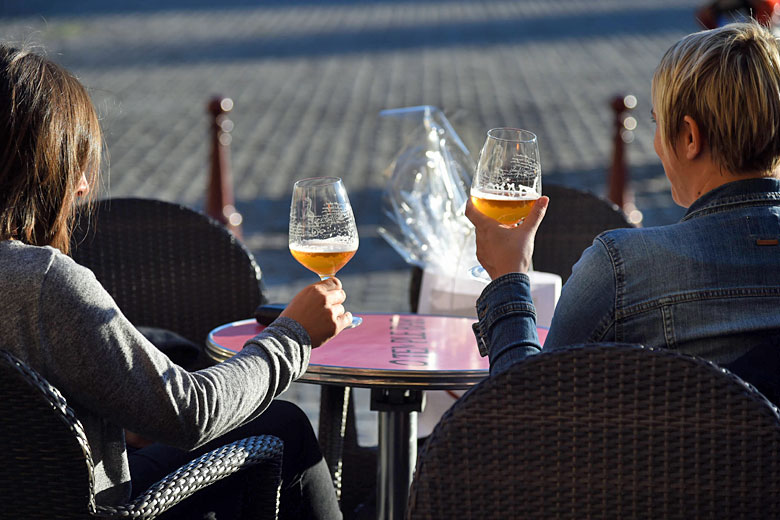 Enjoying a beer in the town square