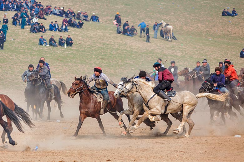 A fast-paced game of Kok boru in action