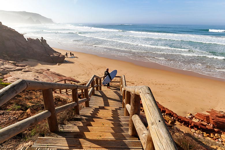 Heading down to catch the surf on Praia do Amado