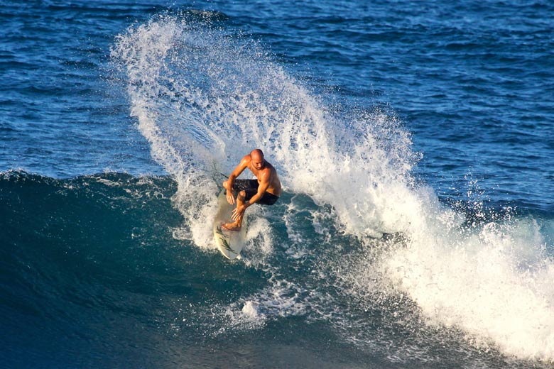 Surfing the Soup Bowl at Bathsheba Beach, Barbados